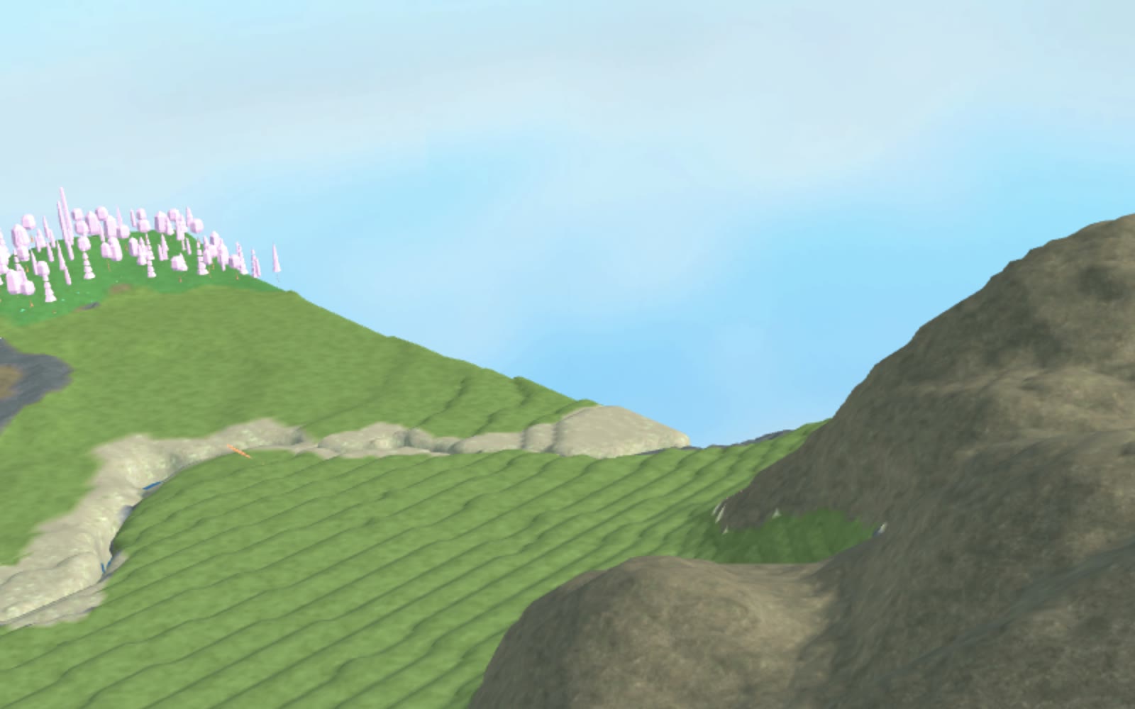 Wide side bird's-eye view across a Japanese-inspired terraced valley toward blossom ridges and rounded highlands in Roblox terrain